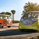 A vintage VW splitscreen van parked alongside the ID Buzz concept.